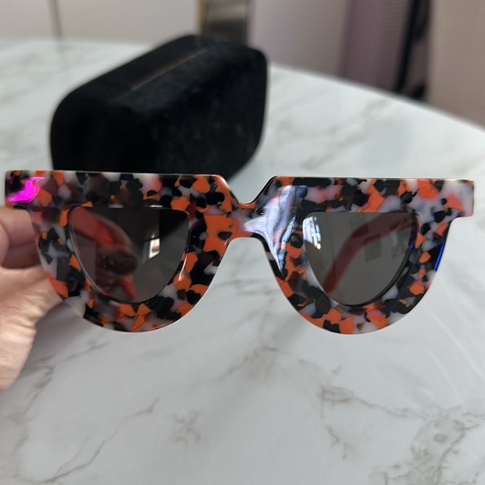 Funky Orange and black tortoise frame sunglasses by CAST.
